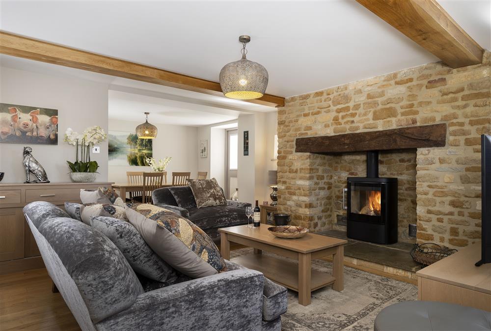 Ground floor: Open-plan living space combining the sitting room and the dining area at Stable Barn, Little Rissington