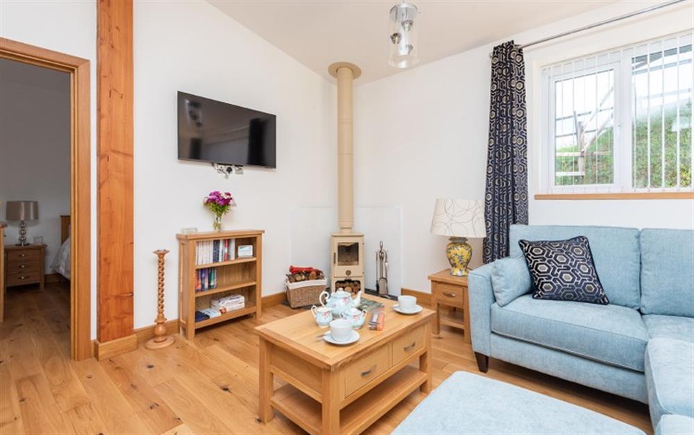 Perfect for winter breaks with a comfortable sofa, log burner and smart TV at Stable Barn in Slapton
