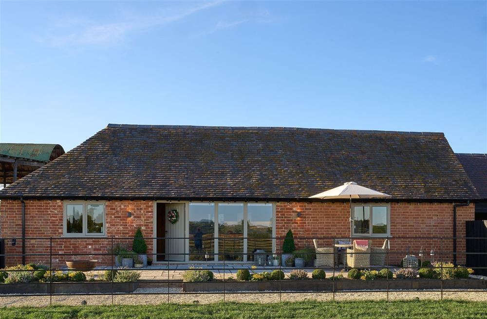 The exterior and patio of Stable Barn