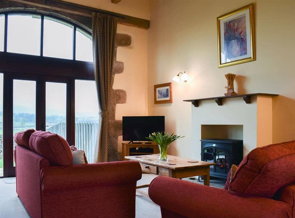 Beautiful high-ceilinged living room with far-reaching views at Stable Cottage in Airton, Nr Skipton., North Yorkshire