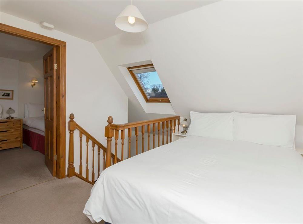 Comfortable double bedroom with access to twin bedroom at Stable Cottage in Alnwick, Northumberland