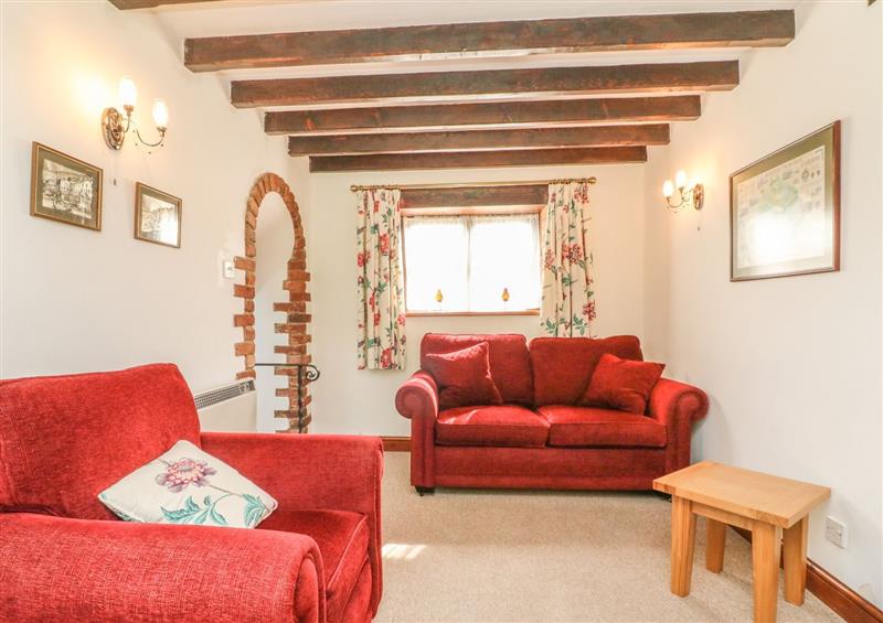 Relax in the living area at Stable Cottage, Colyton