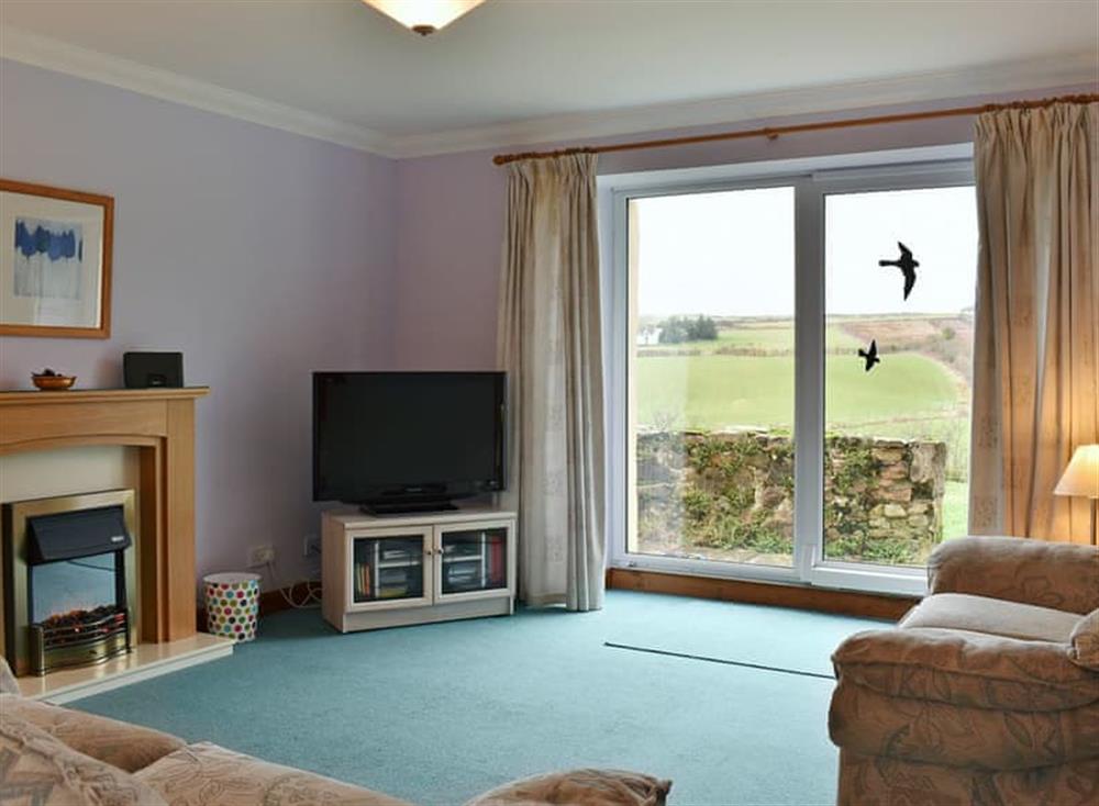 Welcoming living room at Stable Cottage in East Bennan, Isle Of Arran