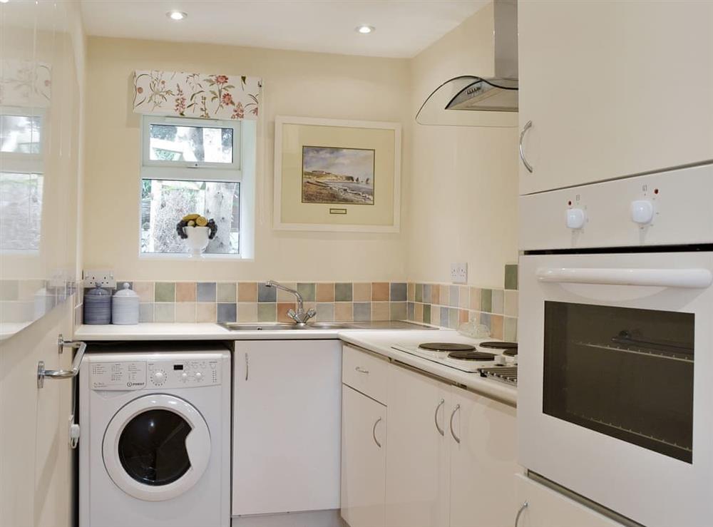 Well-equipped fitted kitchen at Stable Cottage in Gunville, near Newport, Isle of Wight