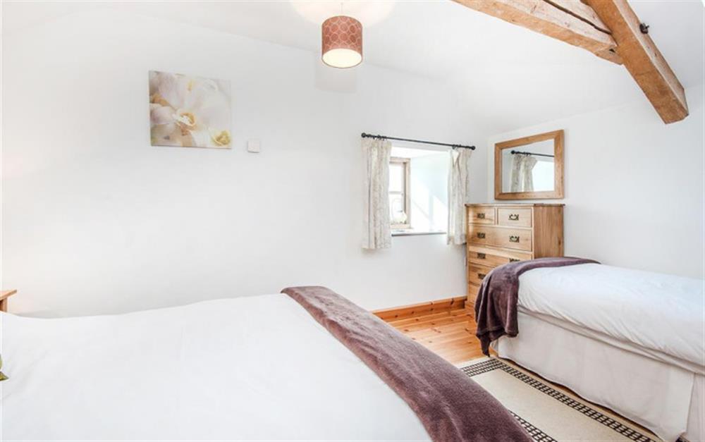 Bedroom 1 sleeps 3. at Stable Cottage in Honiton