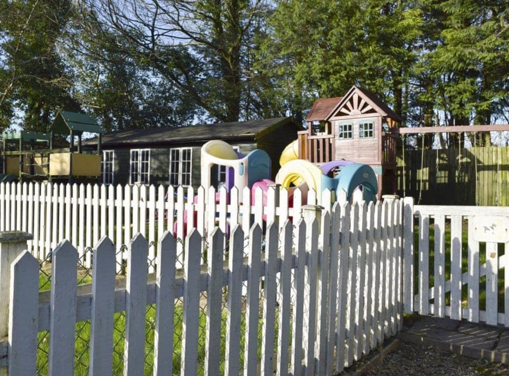 Children’s play area at Stable Cottage in Ivy Court Cottages, Llys-y-Fran, Dyfed