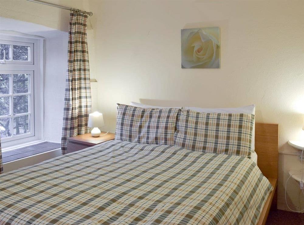 Relaxing double bedroom at Stable Cottage in Ivy Court Cottages, Llys-y-Fran, Dyfed