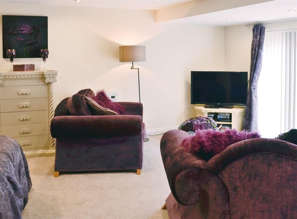 Cosy living area at Stable Cottage in Llandudno, Gwynedd