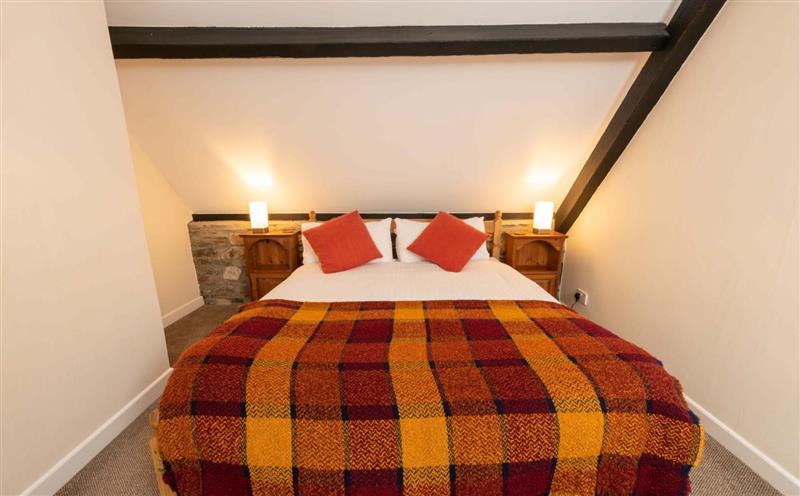 A bedroom in Stable Cottage at Stable Cottage, Minehead