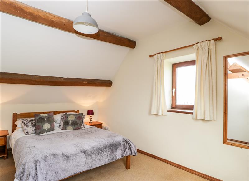 A bedroom in Stable Cottage at Stable Cottage, Oddington near Stow-On-The-Wold