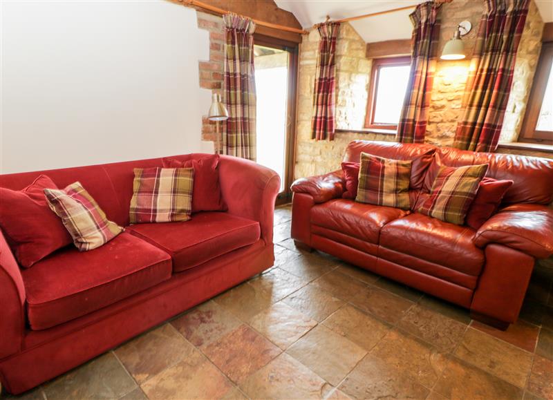 Enjoy the living room at Stable Cottage, Oddington near Stow-On-The-Wold