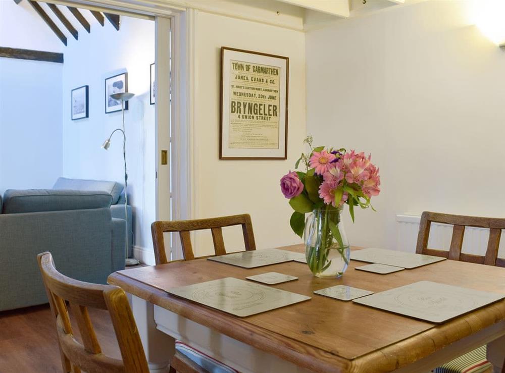 Charming dining area at Stable Cottage in Penally, near Tenby, Pembrokeshire, Dyfed