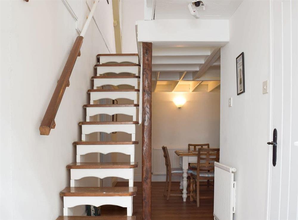 Narrow open tread stairs at Stable Cottage in Penally, near Tenby, Pembrokeshire, Dyfed