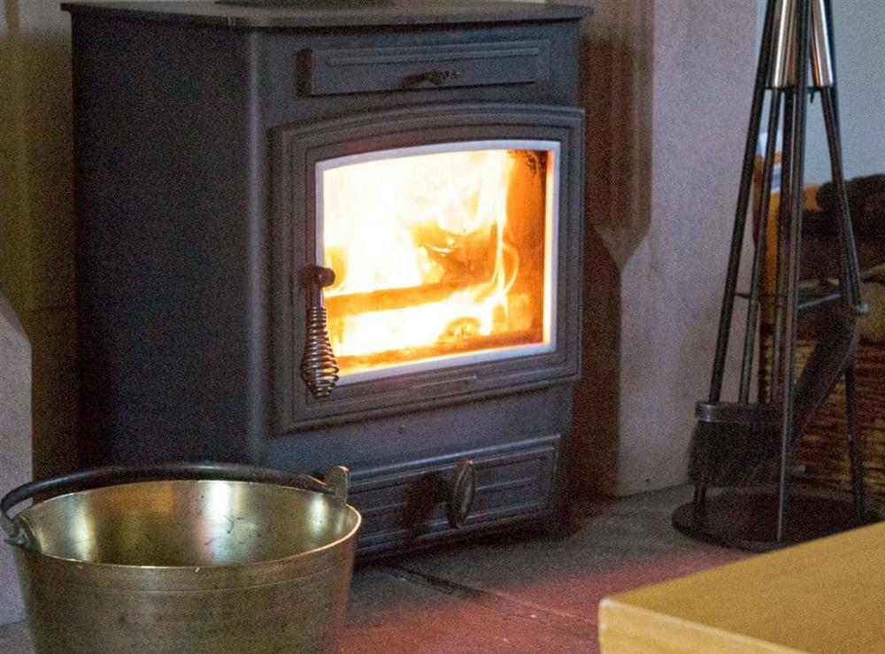 Warming wood-burning fire at Stable Cottage in Penrith, Cumbria