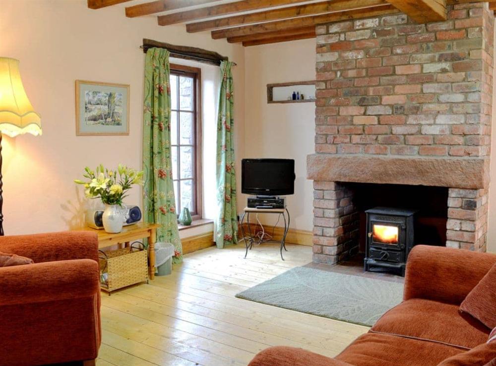 Living room at Stable Cottage in Pooley Bridge, Cumbria