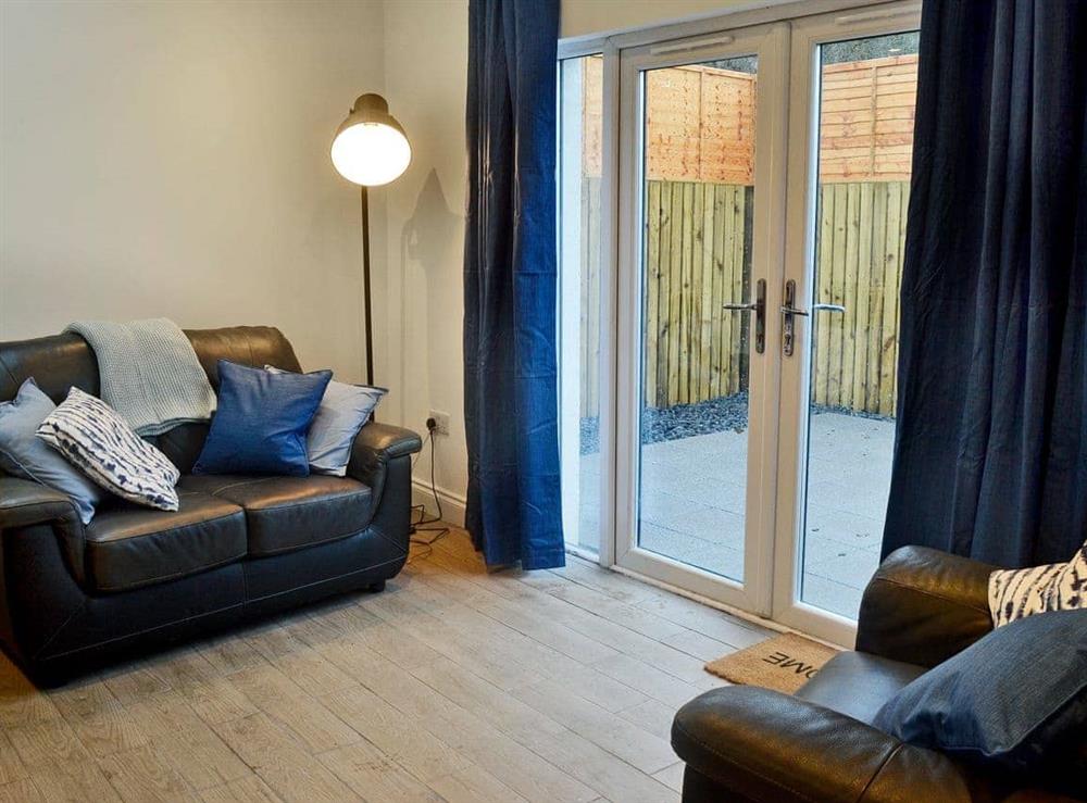 Cosy living area at Stable Cottage in Stewarton, Ayrshire