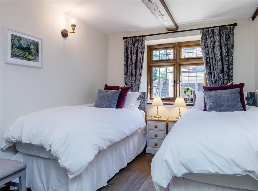 Comfortable twin bedroom at Stable Cottage in Uley, near Dursley, Gloucestershire