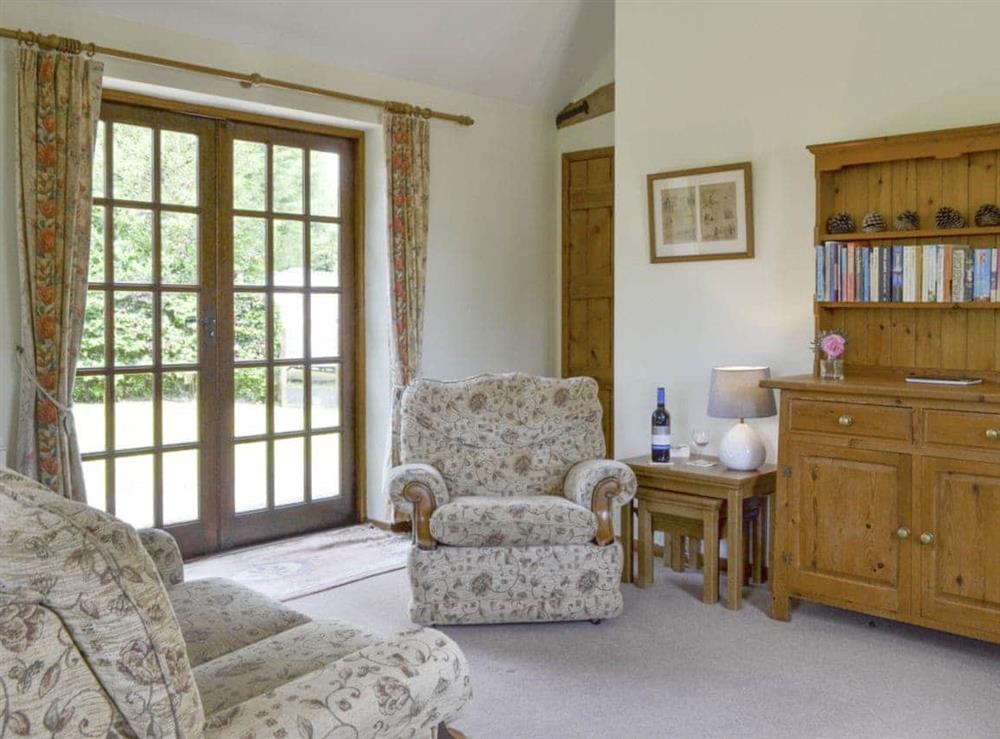 French doors from living room leading to garden at Stable Cottage in Wadhurst, near Tunbridge Wells, East Sussex