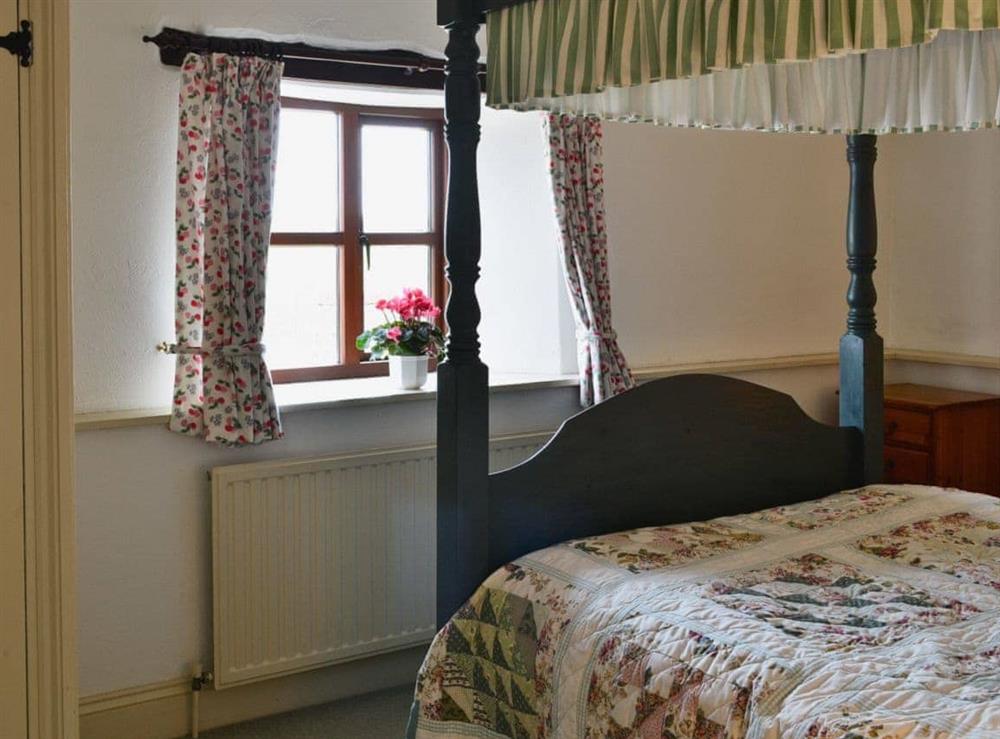 Four Poster bedroom at Stable End in Altarnun, Nr Launceston, Cornwall., Great Britain