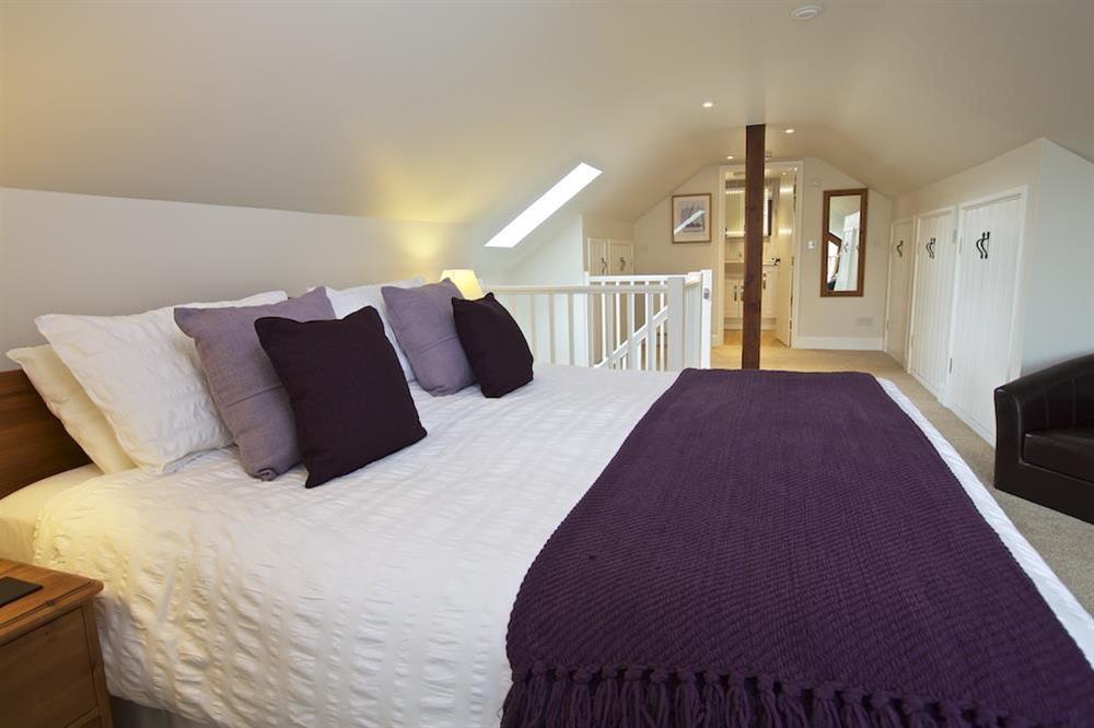 First floor bedroom with 6ft bed at Stable End Cottage in Malborough, Nr Salcombe