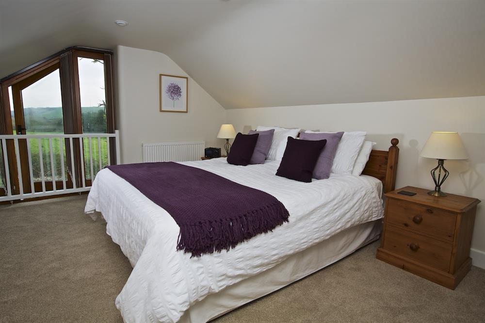 First floor bedroom with country views (photo 2) at Stable End Cottage in Malborough, Nr Salcombe