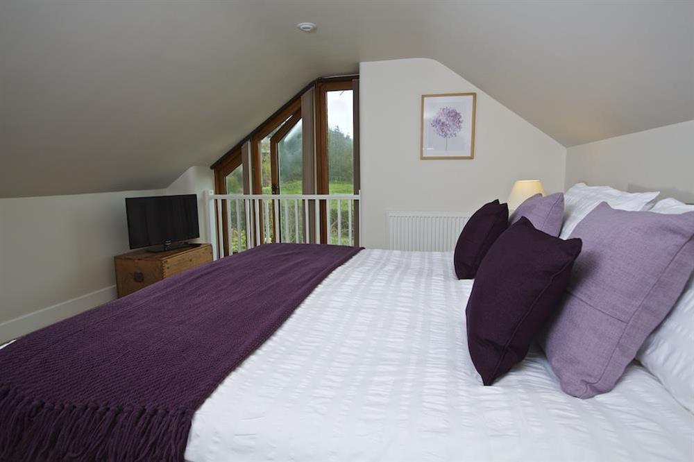 First floor bedroom with country views at Stable End Cottage in Malborough, Nr Salcombe