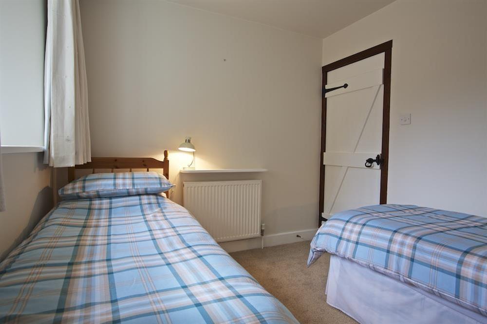 Ground floor twin room at Stable End Cottage in Malborough, Nr Salcombe