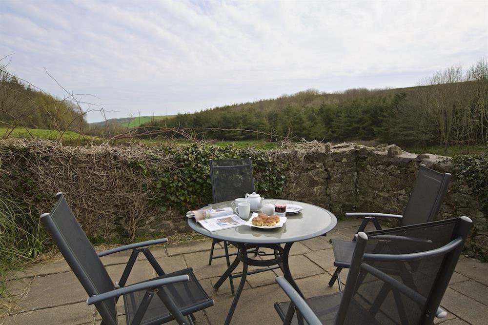 Terrace area with panoramic country views at Stable End Cottage in Malborough, Nr Salcombe