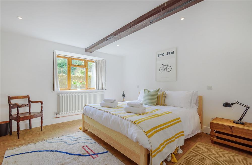Bedroom three boasts exposed beams at Stable House, Clifton Maybank, nr Sherborne