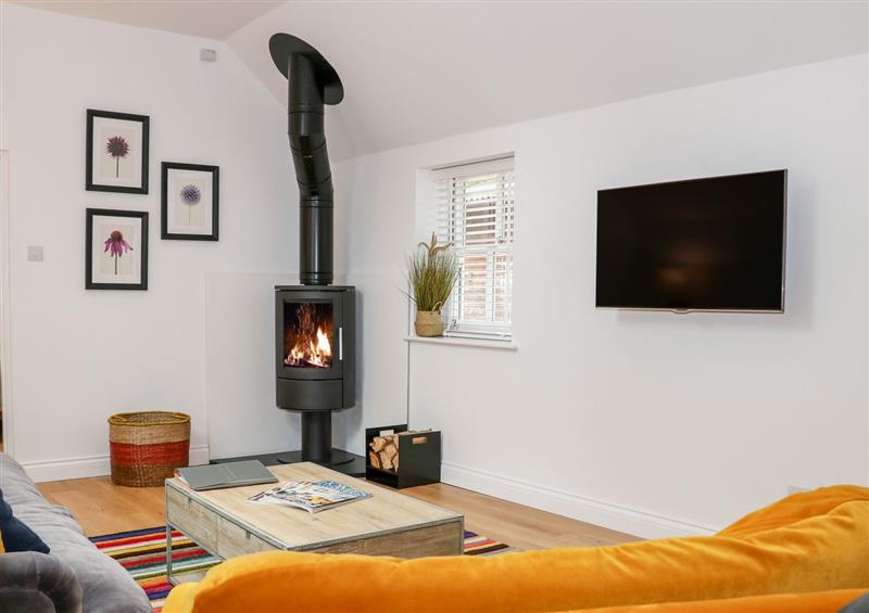 Enjoy the living room at Stables Cottage, Burwash near Heathfield