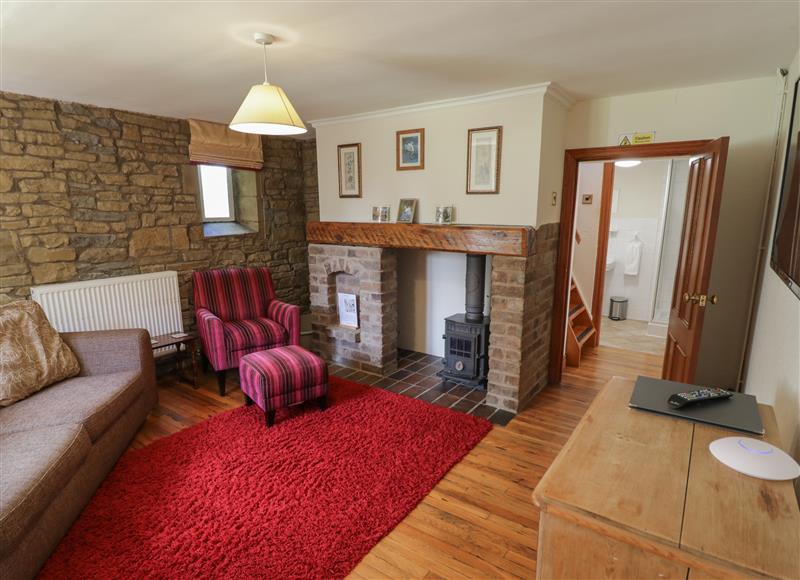 Relax in the living area at Stables Cottage, Shobdon