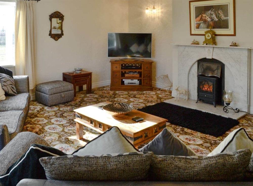 Comfortable living room at Stackgarth in Arkleby, near Aspatria, Cumbria
