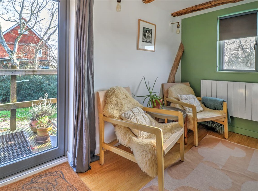 Open plan living space at Staddlestone Barn in Romsey, Hampshire