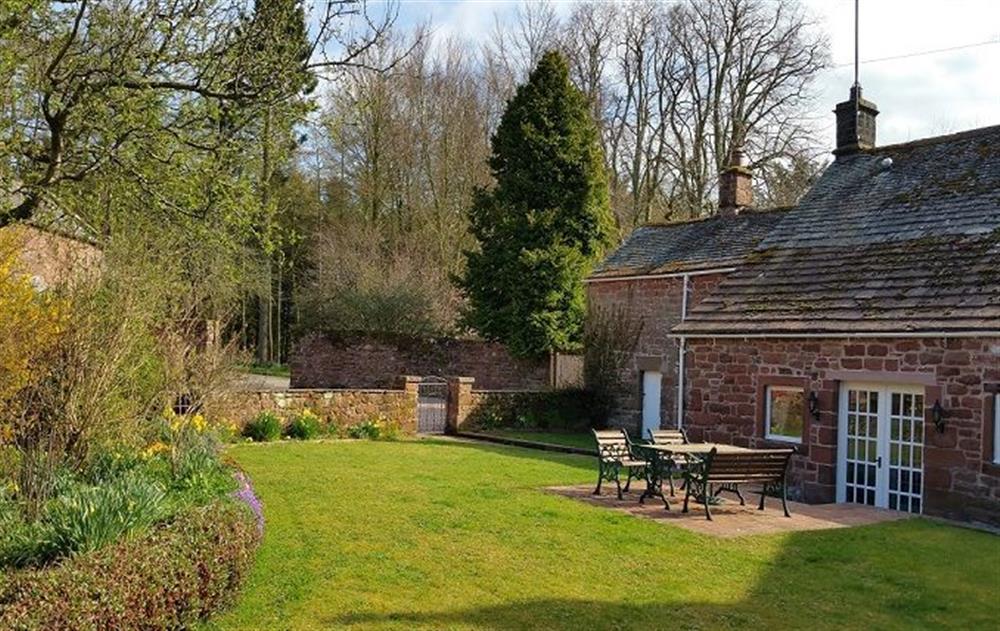 Private front and rear gardens as well as full access to 20 acres of woodland walks at Stag Cottage, Melmerby