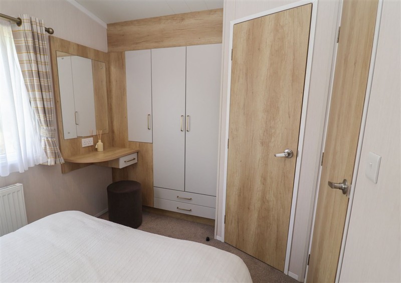 A bedroom in Stag Lodge, Caravan 70 at Stag Lodge, Caravan 70, Fritton near Belton