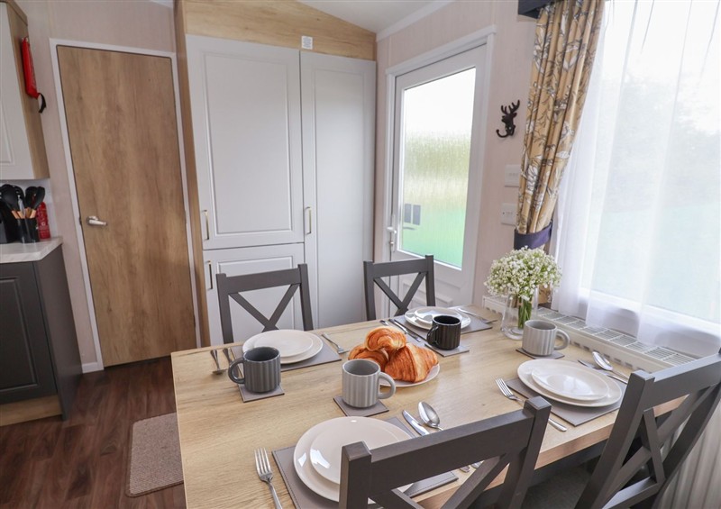 Dining room at Stag Lodge, Caravan 70, Fritton near Belton