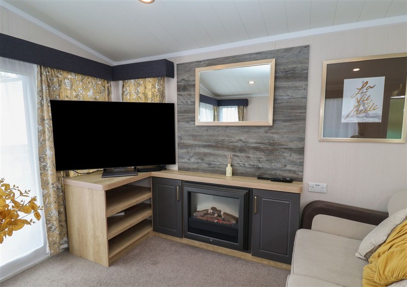 The living room at Stag Lodge, Caravan 70, Fritton near Belton