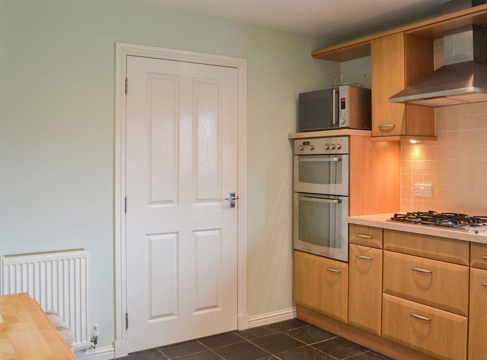 Charming kitchen with breakfast area at Stags Neuk in Aviemore, Scottish Highlands, Inverness-Shire