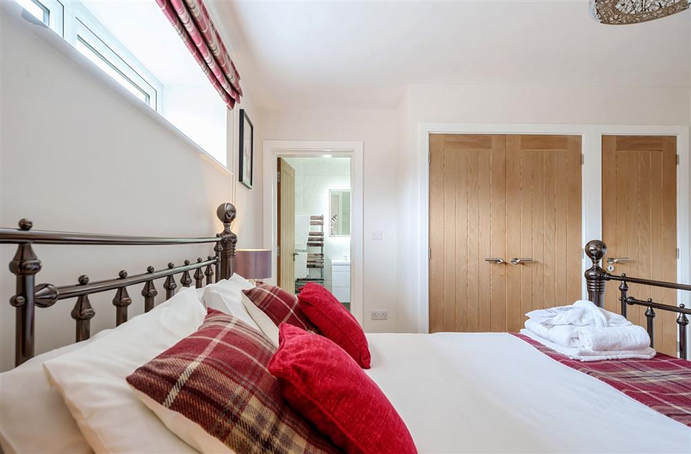 Bedroom one, with fitted wardrobes at Stags Retreat, Sherborne