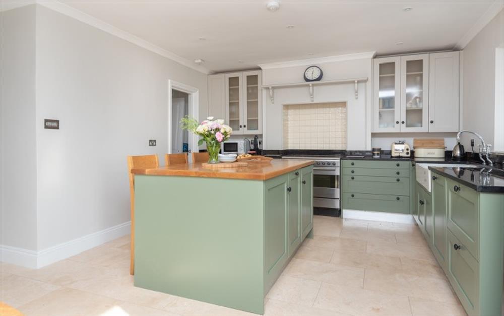 The refurbished kitchen is beautifully appointed  at Stancombe Cottage in Sherford
