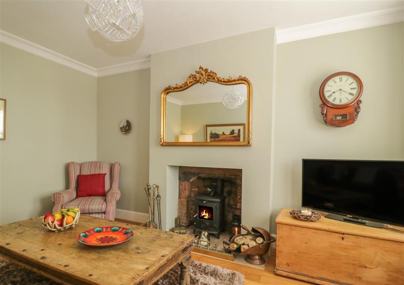 Living room with a wood burning stove at Stapleton Toll, Stapleton Grange, Dumfriesshire