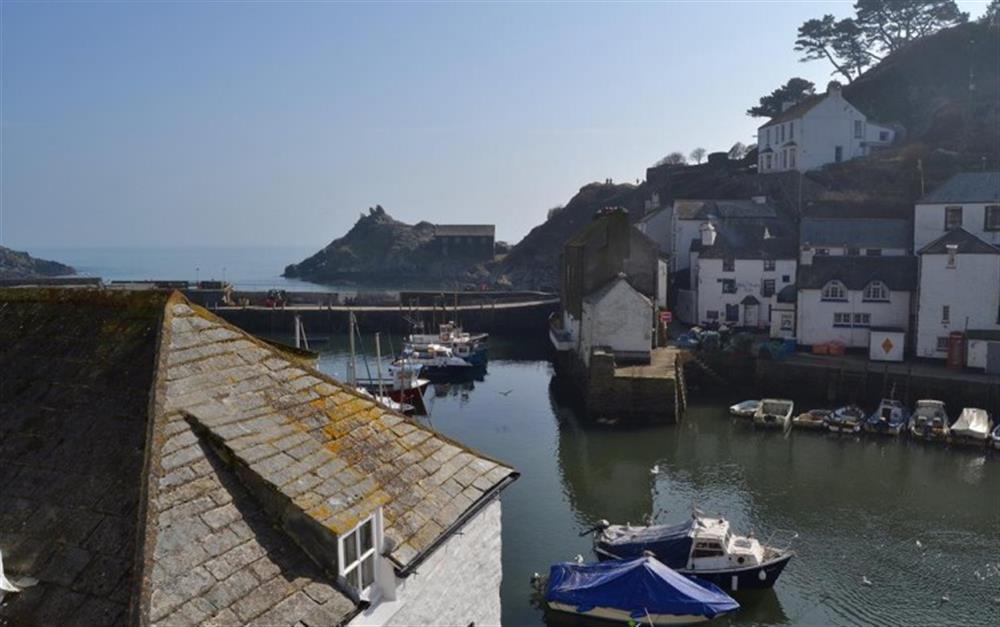 The far reaching views of the Polperro harbour and out to sea from the double bedroom at Star Cottage in Polperro