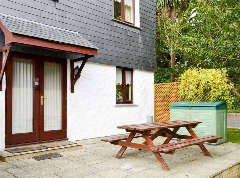 Small garden with patio and garden furniture at Star Gazy in Pendra Loweth, Falmouth, Cornwall