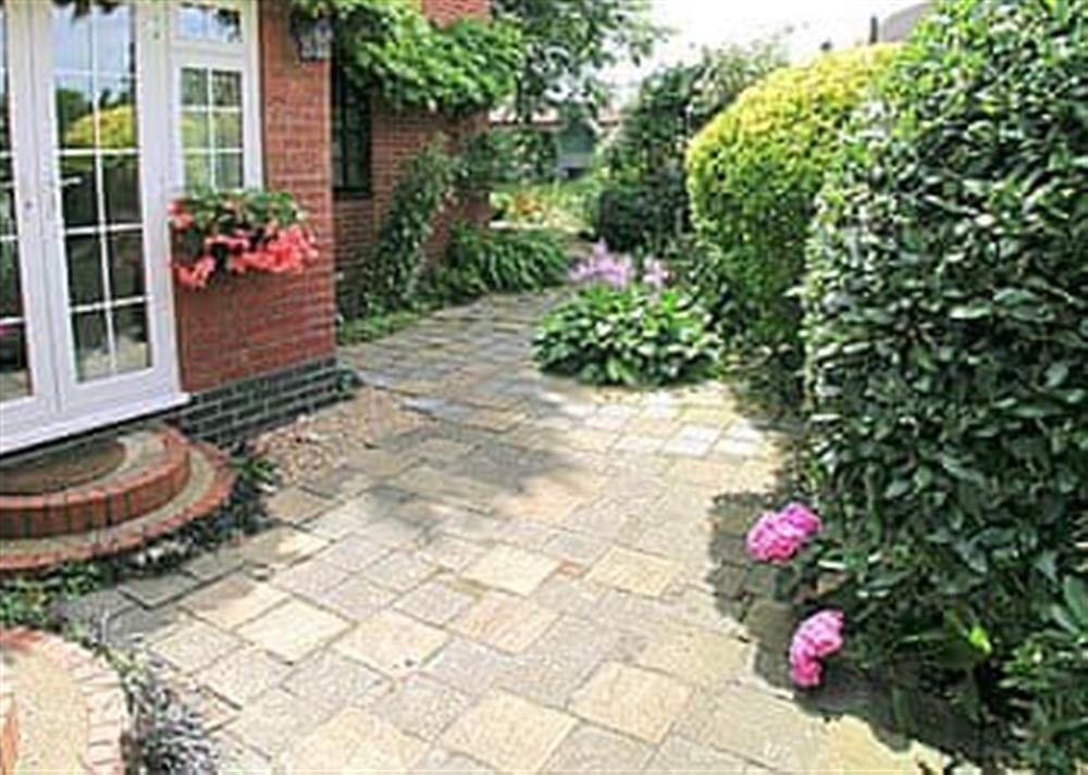 Patio and French doors at Starboard Cottage in Winterton-on-Sea, near Great Yarmouth, Norfolk