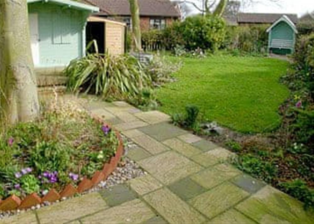 Well-maintained garden at Starboard Cottage in Winterton-on-Sea, near Great Yarmouth, Norfolk