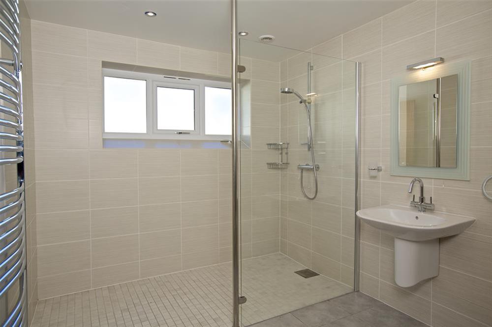 Ground floor shower room with walk in shower at Starboard Light in Malborough, Salcombe