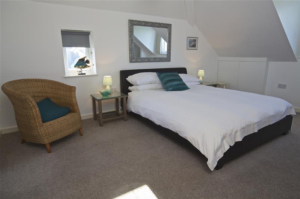 Second first floor bedroom with King-size bed at Starboard Light in Malborough, Salcombe