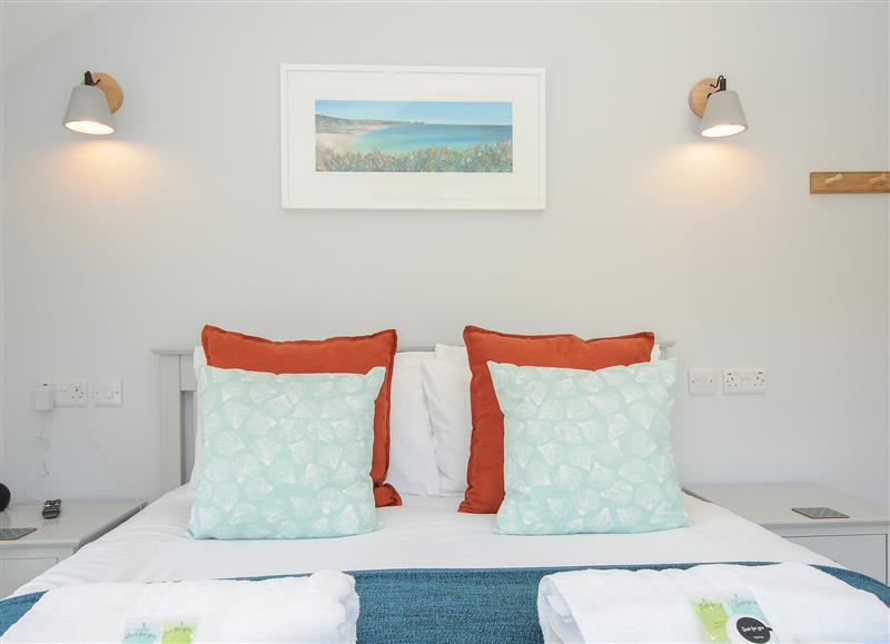 One of the bedrooms at Stargazy Cottage, Praa Sands