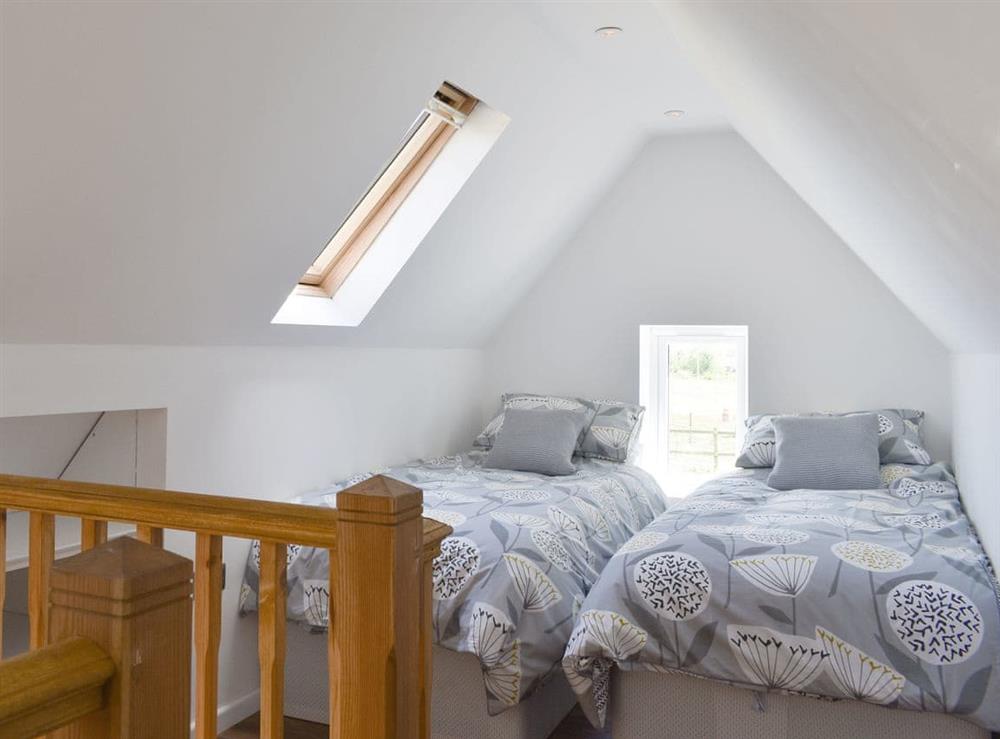 Comfortable twin bedroom at Stars Cottage in Moreton, near Wareham, Dorset
