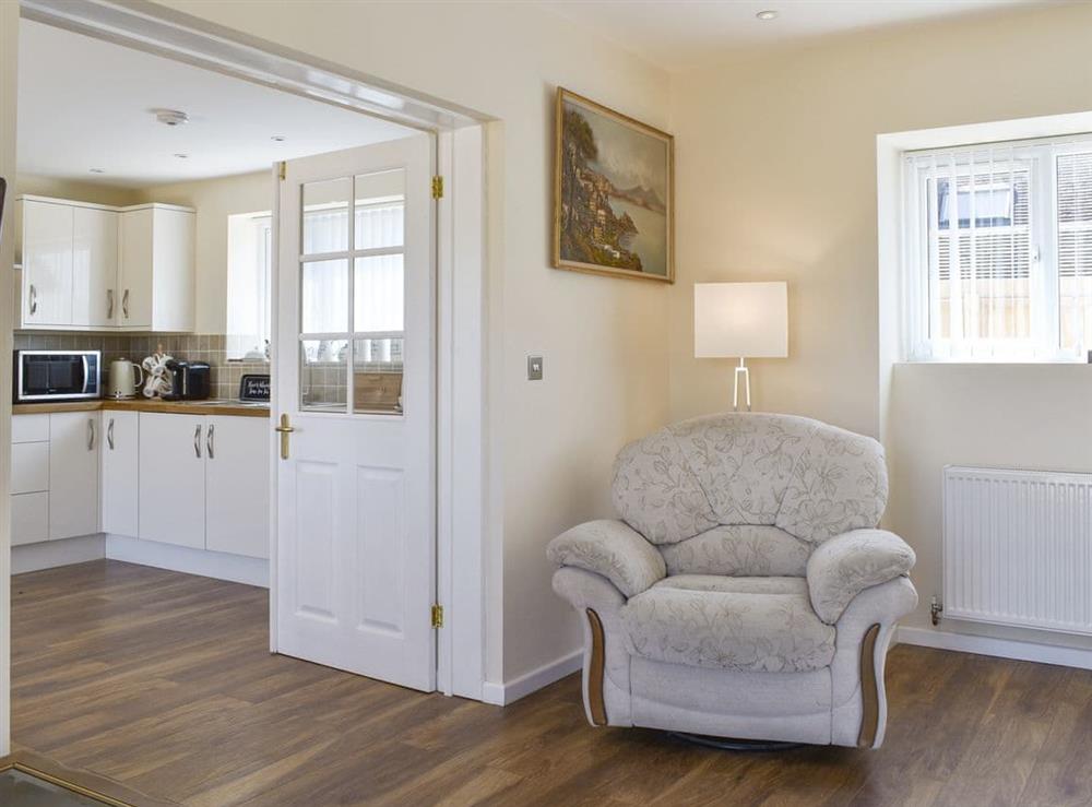 Living area with access to the kitchen/diner at Stars Cottage in Moreton, near Wareham, Dorset